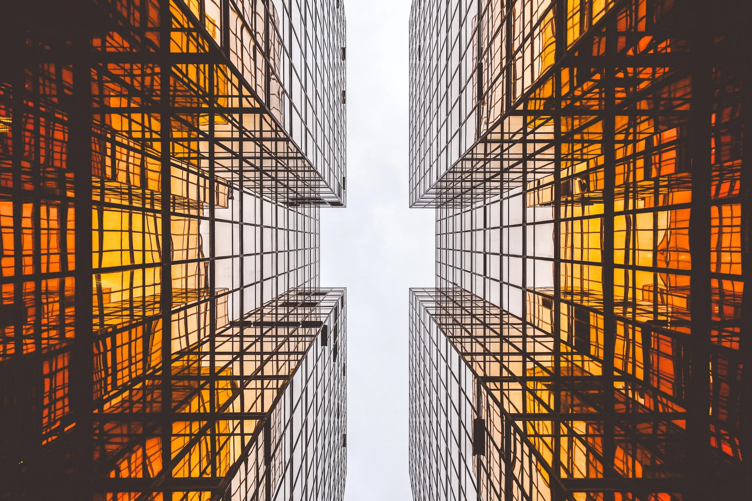 A view looking upward to commercial office buildings
