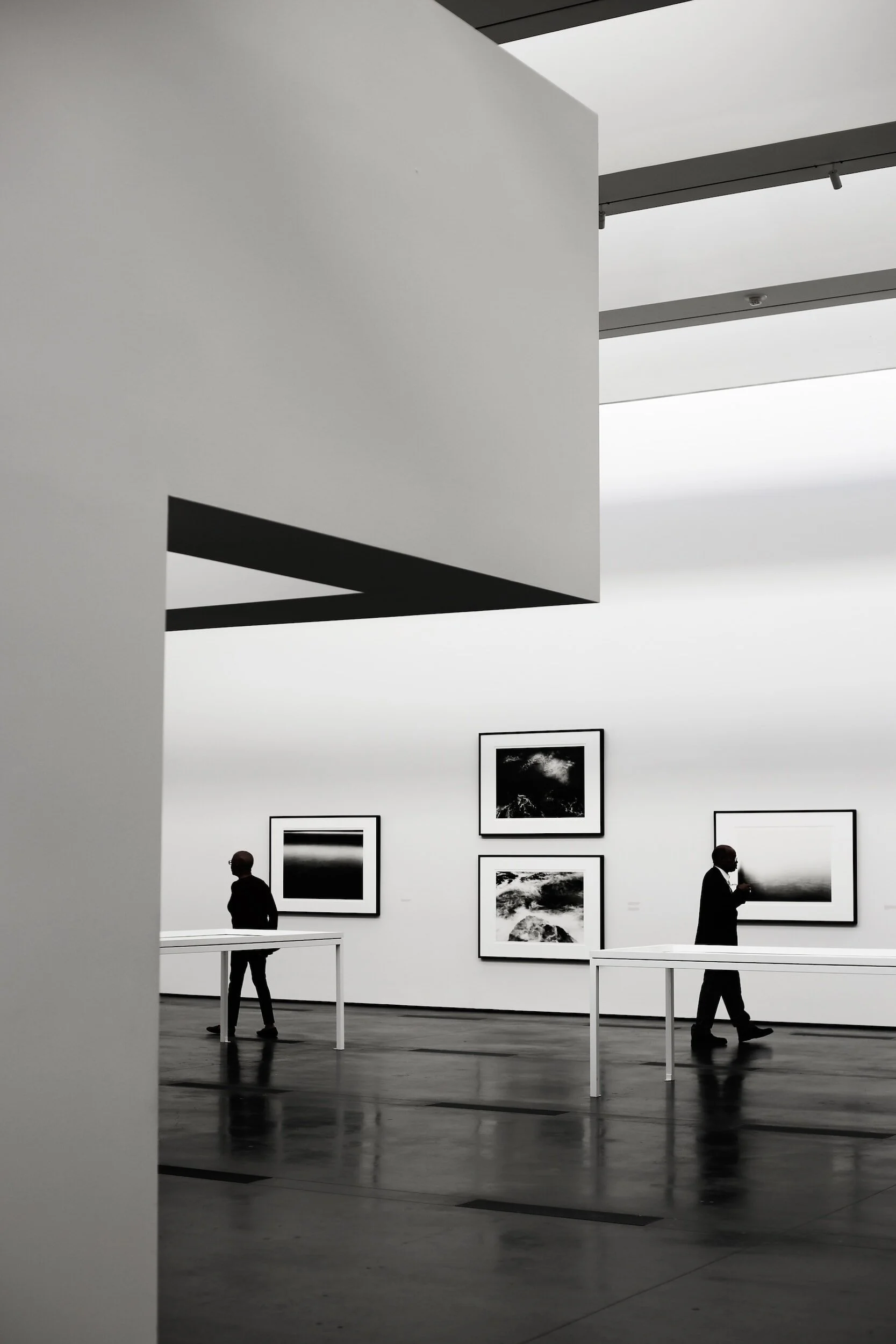 Photos of an internal view of a well designed commercial building with pictures and artwork hanging on the wall